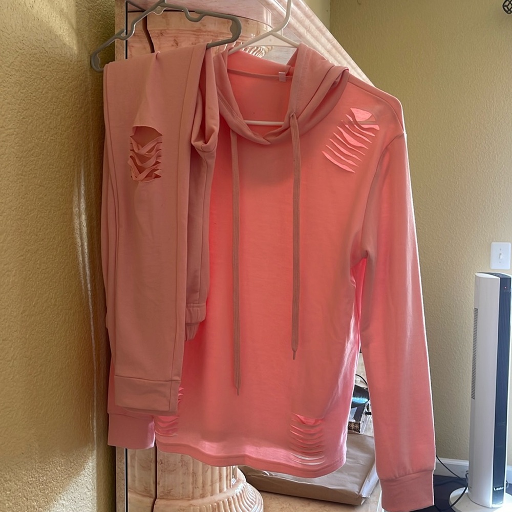 Pink sweater and sweats